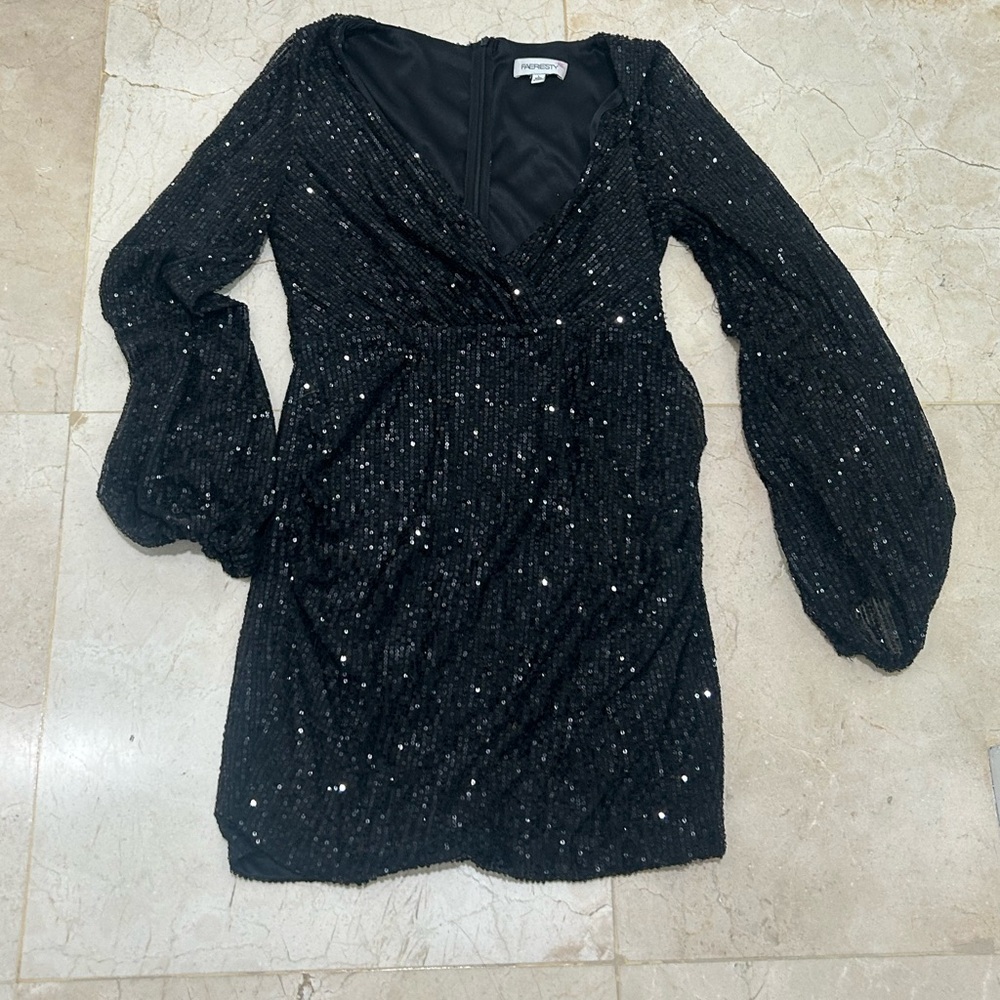 black sparkly dress with long sleeves